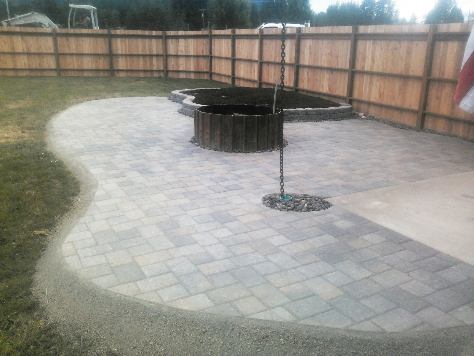 Back patio with fire pit and garden area